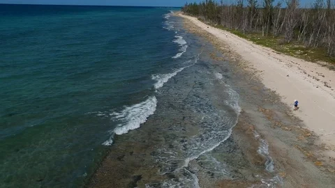 Drone View from Eight Mile Rock Shore Across Tropical Bay, Grand Bahama Stock Footage 99940343