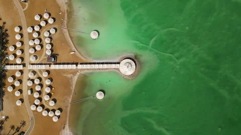 Drone View of Ein Bokek Resort City and Dead Sea Shoreline Israel Vídeos de archivo 337629239