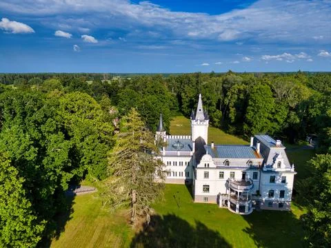 Drone View of Elegant White Castle in Forest Stock Photos