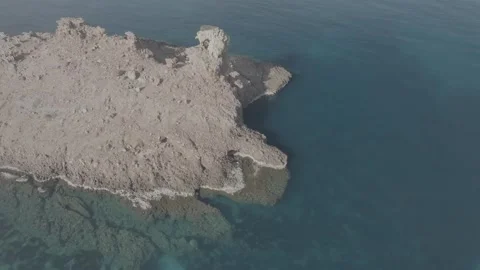 Drone view of the elephant rock formation in Cala Morell, Menorca - D Log Stock Footage 246535609