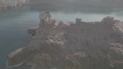 Drone view of the elephant rock formation in Cala Morell, Menorca - D Log Stock Footage 246535621