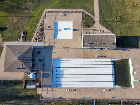 Drone view of an empty and drained winterized swimming pool Stock Photos