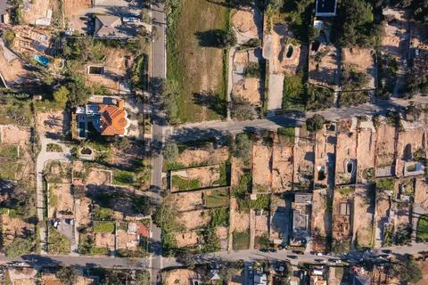 Drone view of empty lots of homes left behind from the Eaton fire Stock Photos