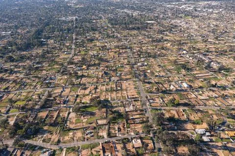 Drone view of empty lots of homes left behind from the Eaton fire Stock Photos