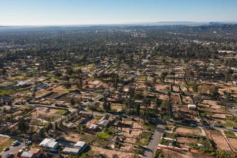 Drone view of empty lots of homes left behind from the Eaton fire Stock Photos