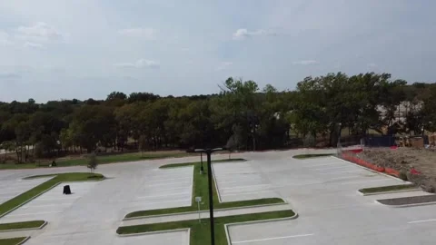 Drone View of Empty Parking Lot With New Campus Buildings Vídeos de archivo 346971636