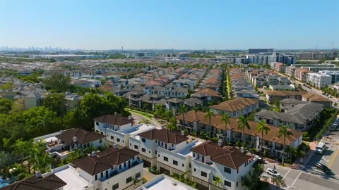 Drone view of endless rows of similar beautiful houses in residential area of Stock Footage 245955525