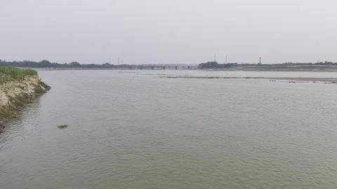 Drone view of an eroded shoreline and bridge near the Garai River in bangladesh Stock Footage 337077931