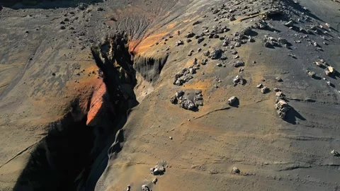 Drone view of an eroded volcanic canyon cutting through ash and basalt rock Stock Footage 332370259