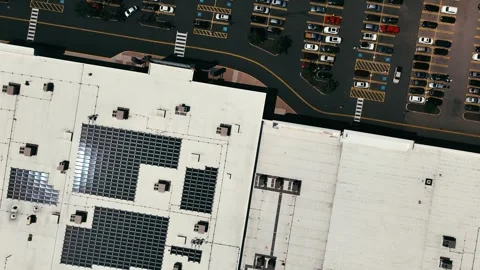 Drone view of an expansive parking lot with rows of parked cars... 動画素材 340657922