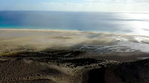 Drone view of exposed sand at low tide at Sotavento Beach. Stock Footage 284388907