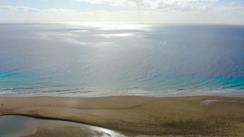 Drone view of exposed sand at low tide at Sotavento Beach. Stock Footage 284389152