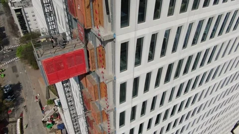 Drone View of External Construction Elevator on the New Raleigh Civic Tower Stock Footage 331621263