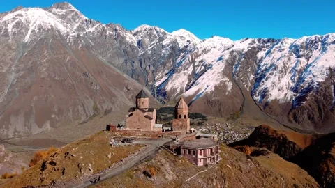 Drone view of famous Mount Kazbegi Stock Footage 224921246