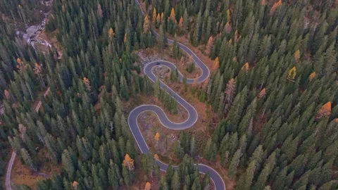 Drone view of famous Snake Road winding across autumn hills, Italy Stock Footage 321600458