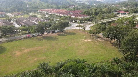 Drone view of field and house in Desa Pinggiran Putra Stock Footage 149279309
