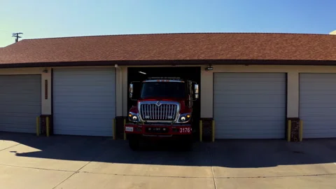 Drone view of fire truck at a fire station Stock Footage 341249164