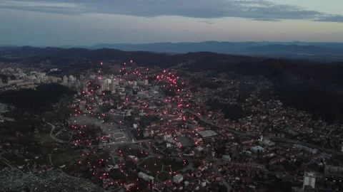 Drone view of a firework exploding above a cityscape Stock Footage 238468475