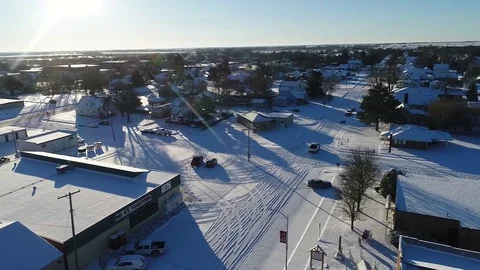 Drone view of a first winters snow on small ks town 4 Stock Footage 83999527