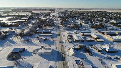 Drone view of a first winters snow on small ks town 1 Stock Footage 83999544