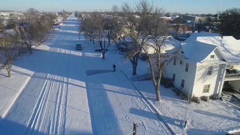 Drone view of a first winters snow on small ks town 6 Stock Footage 84355355