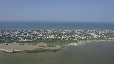 Drone view of the fishing town of progreso in yucatan with its mangrove Video stock 231272287