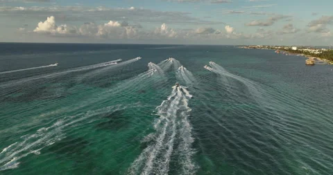 Drone View of Fleet of Boats Speeding Across Caribbean Ocean Near Belize Island 스톡 동영상 300361817
