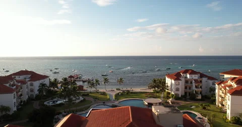 Drone View of Fleet of Boats Speeding Off Race at Caribbean Sunrise 스톡 동영상 300361906