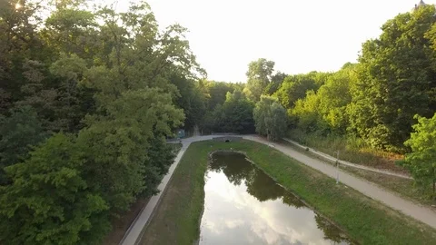 Drone view the flight rises and the view of the church in the park opens Stock Footage 111875255