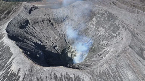 Drone view fly to Bromo volcano crater and tilt down, East Java, Indonesia 스톡 동영상 293079589
