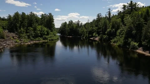 Drone View - Flying away from Wilson's Falls down river - Bracebridge, Musko Stock Footage 314233862