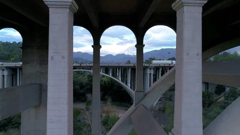 Drone view flying into large bridge in Pasadena California 스톡 동영상 127048459