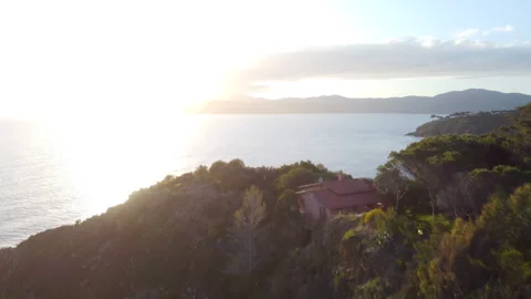 Drone view flying low above the sea near the coast Stock Footage 323003626