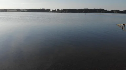 Drone View Flying Low Over Reservoir Rutland Water Normanton Church 4K Aerial Stock Footage 112827327