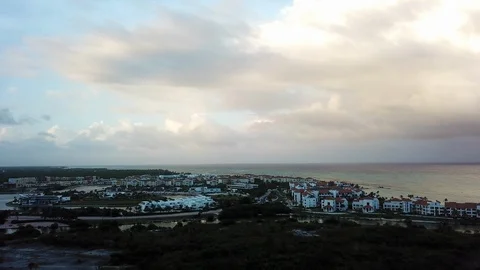 Drone view flying over Caribbean resorts in Cap Cana towards ocean Stock Footage 113595571