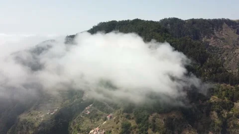 Drone view flying over a forest with clouds. Filming the deep forest from above Stock Footage 172261955