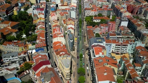 Drone view flying over the historic cityscape of lisbon, portugal, showing .. Video stock 327632752