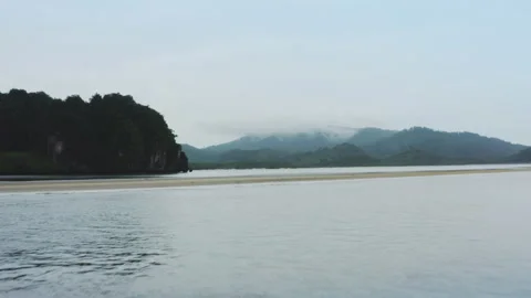 Drone view flying over sea water into the mountain Vídeo Stock 156065361