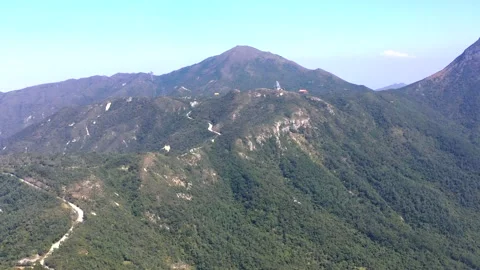 Drone view flying to the Po Lin Monastery, Giant Buddhist Statue under repair Stock-Footage 149547719