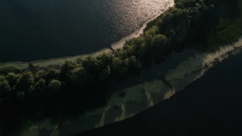 Drone view Flying right above the river, the camera is lowered onto the water Stock Footage 111890880
