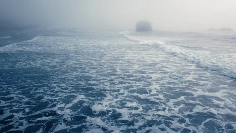 Drone view a foaming ocean wave on a foggy day (Ariya's Beach, Oregon, USA) Stock Footage 123392200