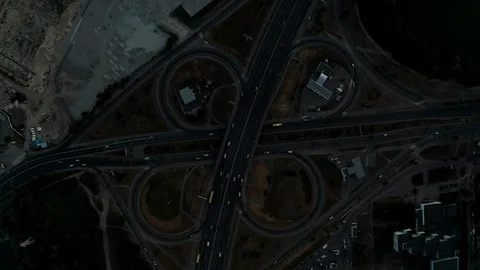 Drone view footage Lowering down above the road junction smoothly turning Stock Footage 111872984