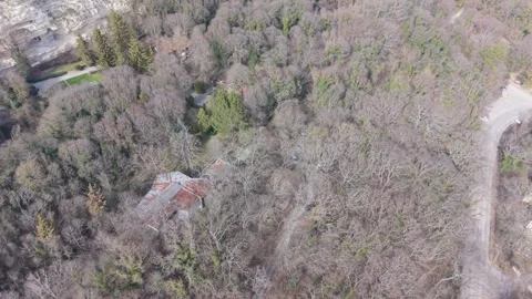 Drone view forest landscape with road stretching across natural terrain 스톡 동영상 331424671