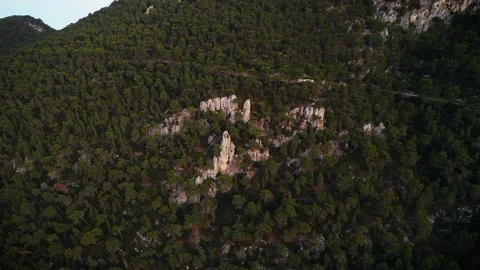Drone view of forested mountain peak at sunrise in Spain Stock Footage 314605012