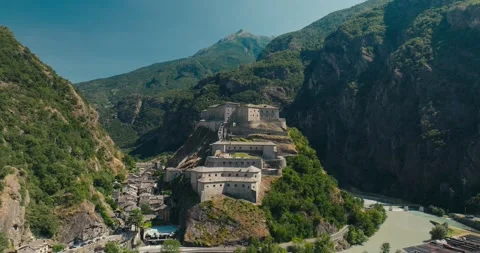 Drone View of Fort Bard in Aosta Valley with River and Alpine Mountains, Italy Stock Footage 340885736