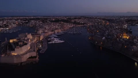 Drone view from Fort St. Angelo to yacht marina at sunset, Malta. Stock Footage 247319555