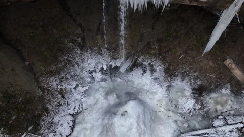 Drone view of a freezing waterfall Stock Footage 285238989