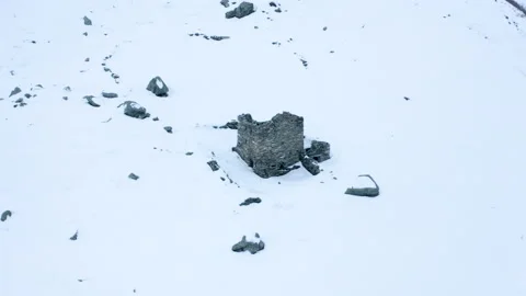 Drone view of frozen low alpine landscape on overcast day 4k Stock Footage 143326601