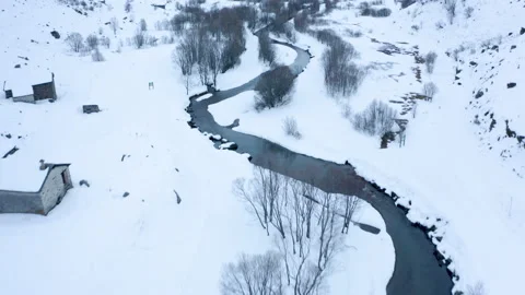 Drone view of frozen low alpine landscape on overcast day 4k Stock Footage 143328954