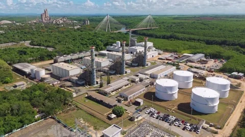 Drone view of generation facility, fuel storage tanks, substation, and Video stock 318393035